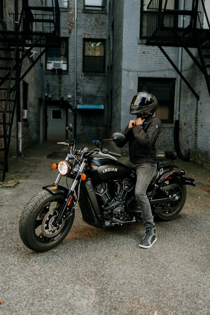 a person on a motorcycle practicing motorcycle safety tips